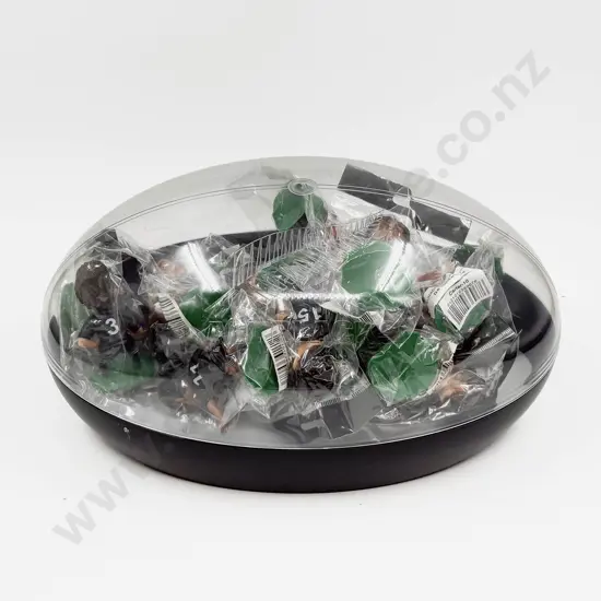 All Black Figures in Rugby Ball Container