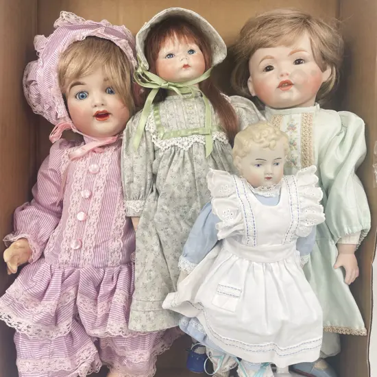 Four New Bisque Dolls