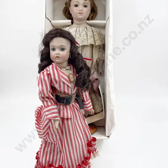 Two New Bisque Dolls