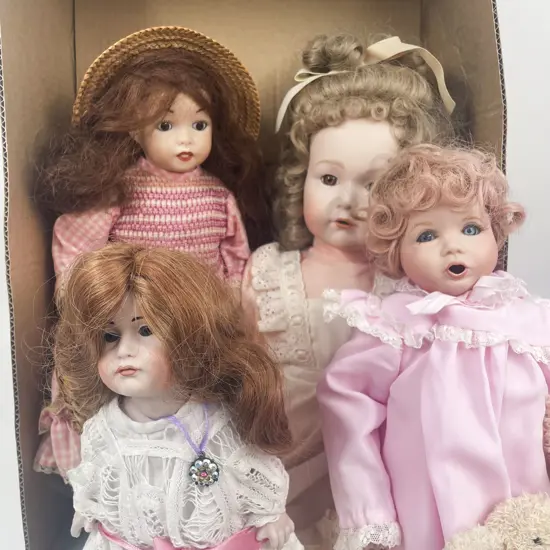 Four New Bisque Dolls