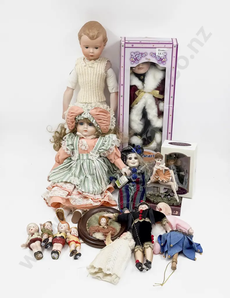 New Bisque Character Boy Doll with Assorted large and small bisque dolls and novelties Image 1++