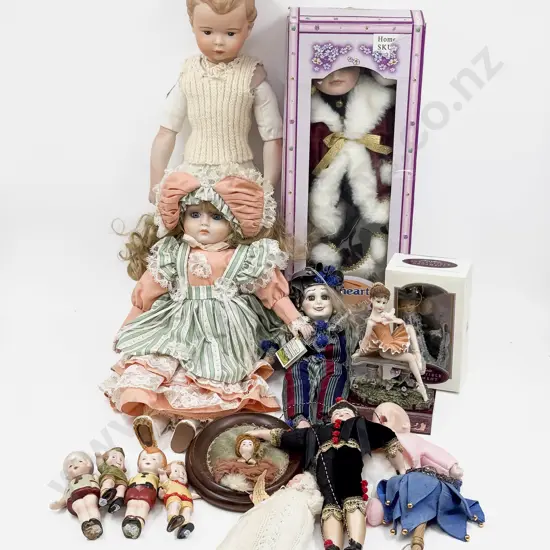 New Bisque Character Boy Doll with Assorted large and small bisque dolls and novelties
