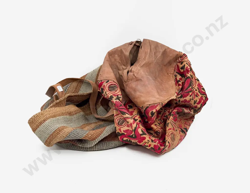 Empty Leather Pouffe together with Hand Woven African Basket with Leather Strap Image 1++