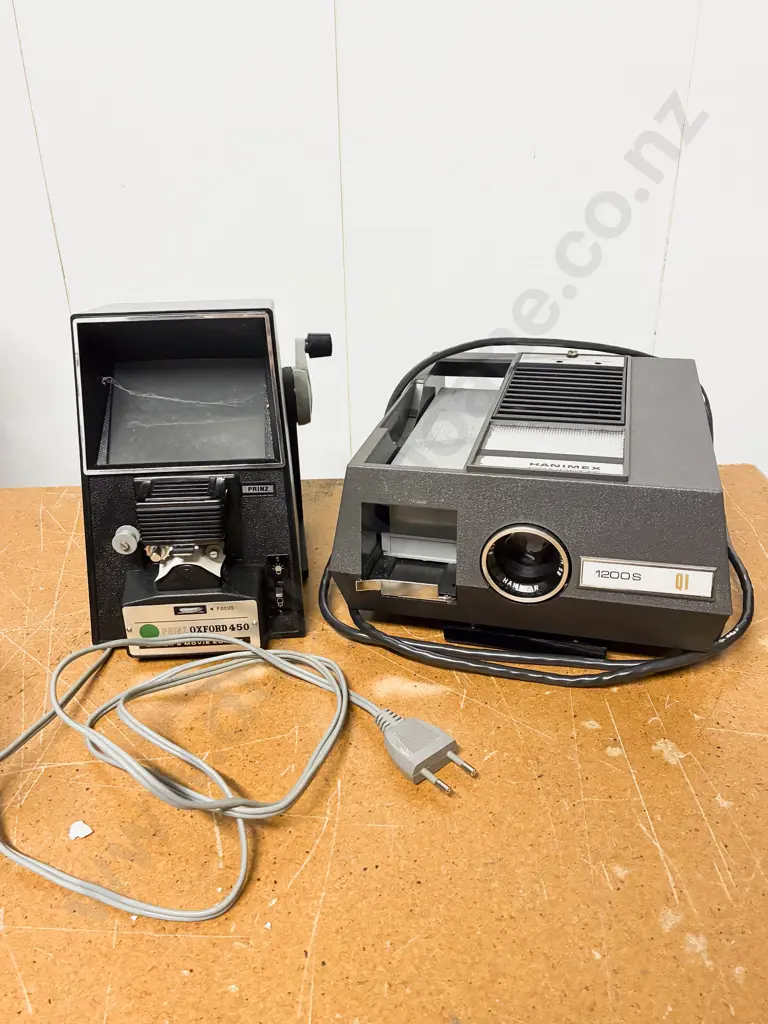 Boxed Hanimex Projector together with Super 8 Movie Editor Image 1++