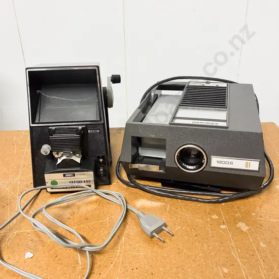 Boxed Hanimex Projector together with Super 8 Movie Editor