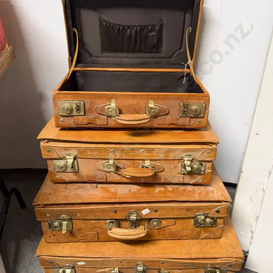 Graduated Family Set of Four Tan Leather Suitcases