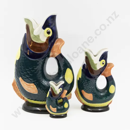 Set of Three Bretby Graduated Fish Form Jugs Tallest 27cm H