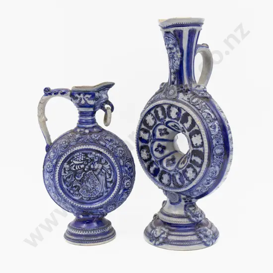 Two Dutch Jugs With Mask Spouts Tallest 36cm H