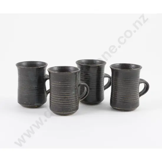 Four John Crawford Mugs