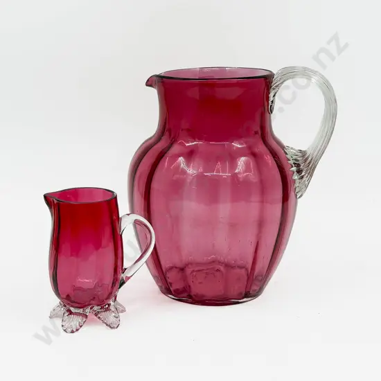 Cranberry Glass Jug & Smaller Example