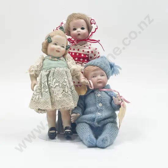 Three Small New Bisque Dolls