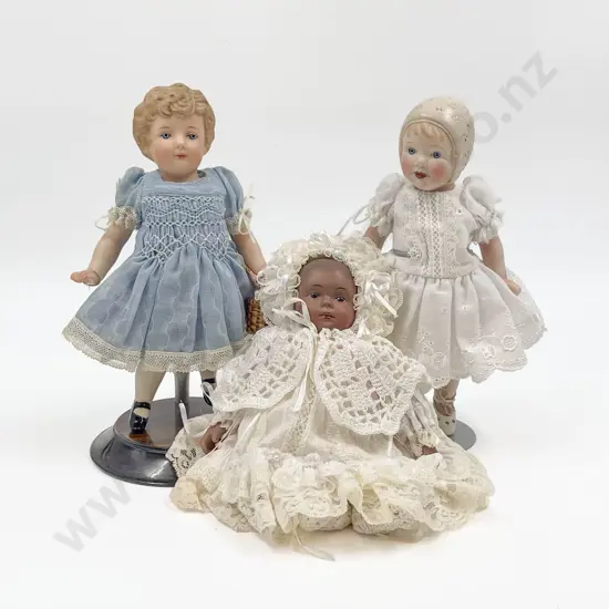 Three Small New Bisque Dolls