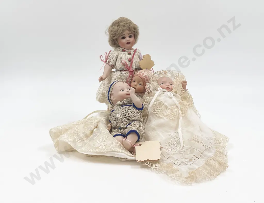 Four Small New Bisque Dolls Image 1++