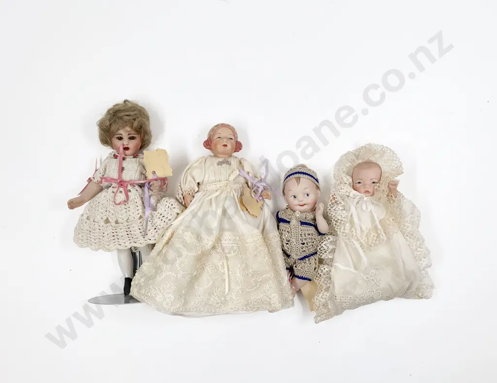 Four Small New Bisque Dolls Image 1++