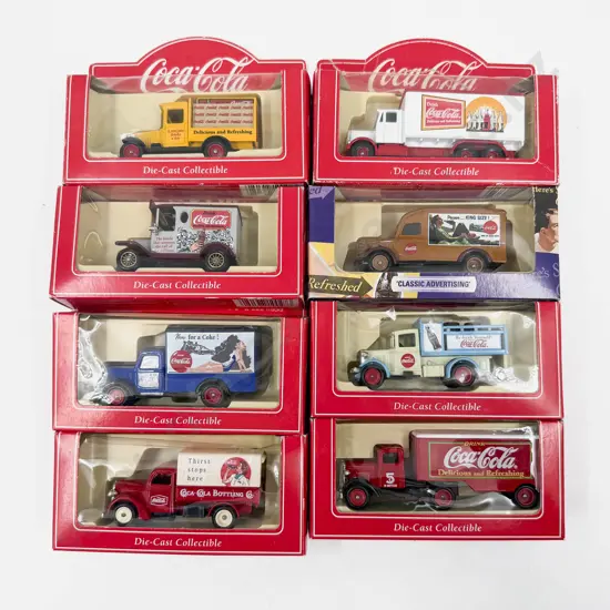 Eight Boxed Lledo Coco-Cola Advertising Models