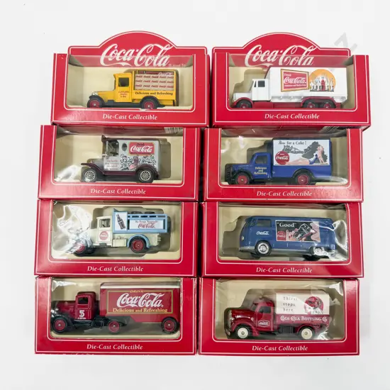 Eight Boxed Lledo Coco-Cola Advertising Models