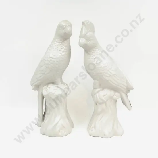 A Pair of French Country Collections White Glazed Parrots
