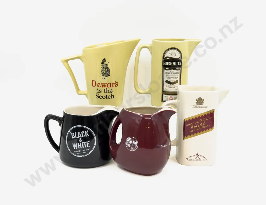 Five Assorted Whisky Advertising Jugs Image 1++