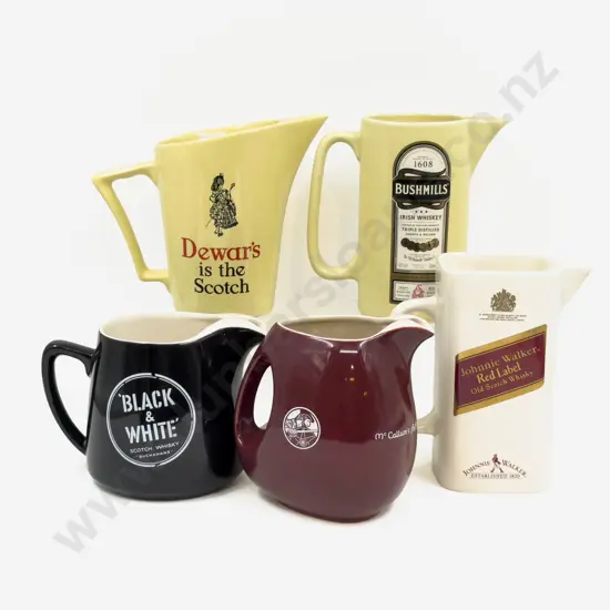 Five Assorted Whisky Advertising Jugs