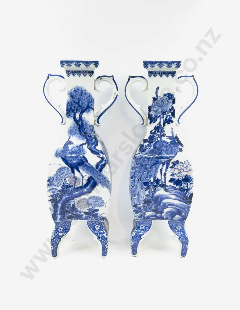 A Pair of Chinese Blue & White Footed Vases Image 1++