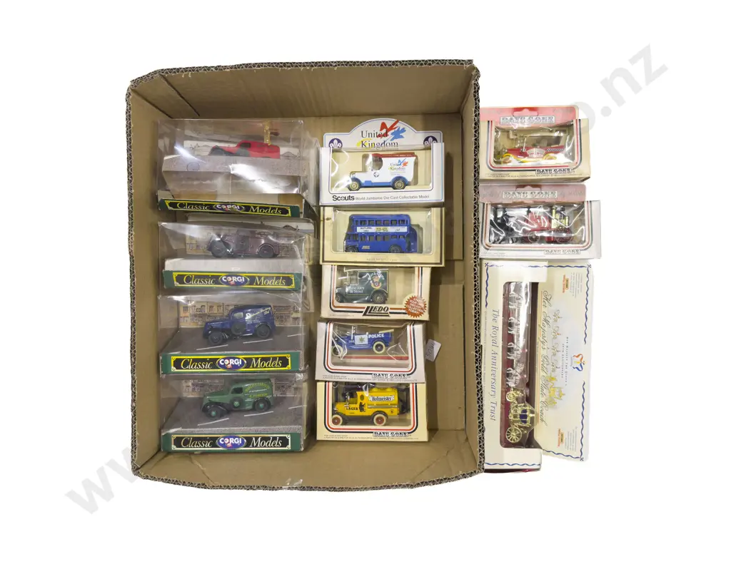 Eleven Assorted Diecast Boxed Model Vehicles together with Boxed Matchbox "Her Majesty's Gold Stage Coach" Image 1++