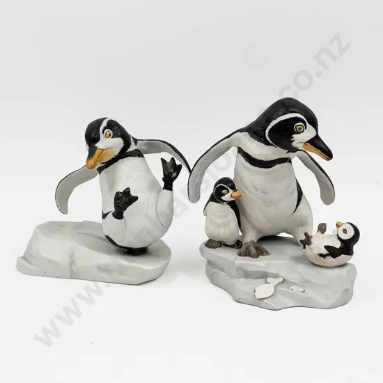 Two Franklin Mint Penguin Group Figures