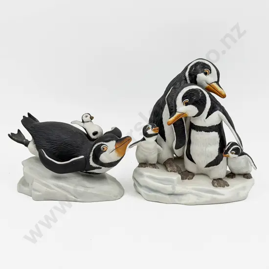 Two Franklin Mint Penguin Group Figures