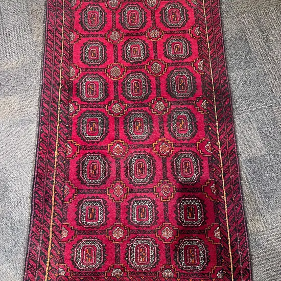 Persian Woollen Floor Rug on Red Ground