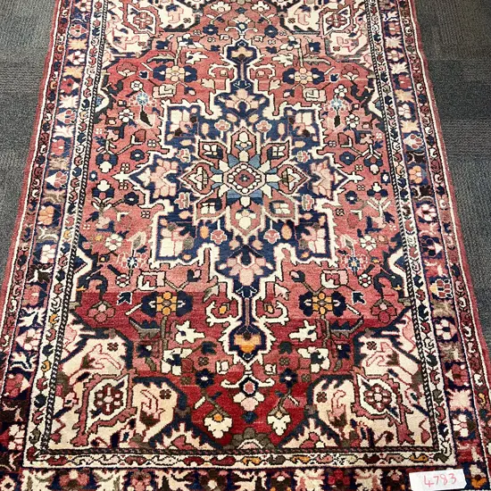 Woollen Persian Floor Rug with Large Centralised Floral Medallion