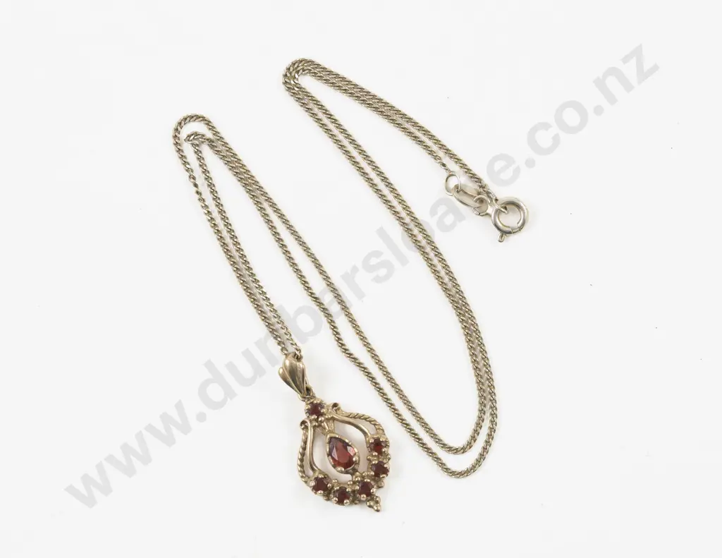 9ct Seven Stone Garnet Pendant Image 1++