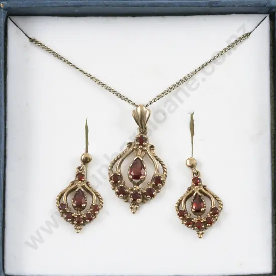 9ct Seven Stone Garnet Pendant