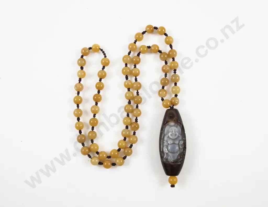 Carved Agate Buddha Pendant on Single Strand Amber Bead Necklace Image 1++