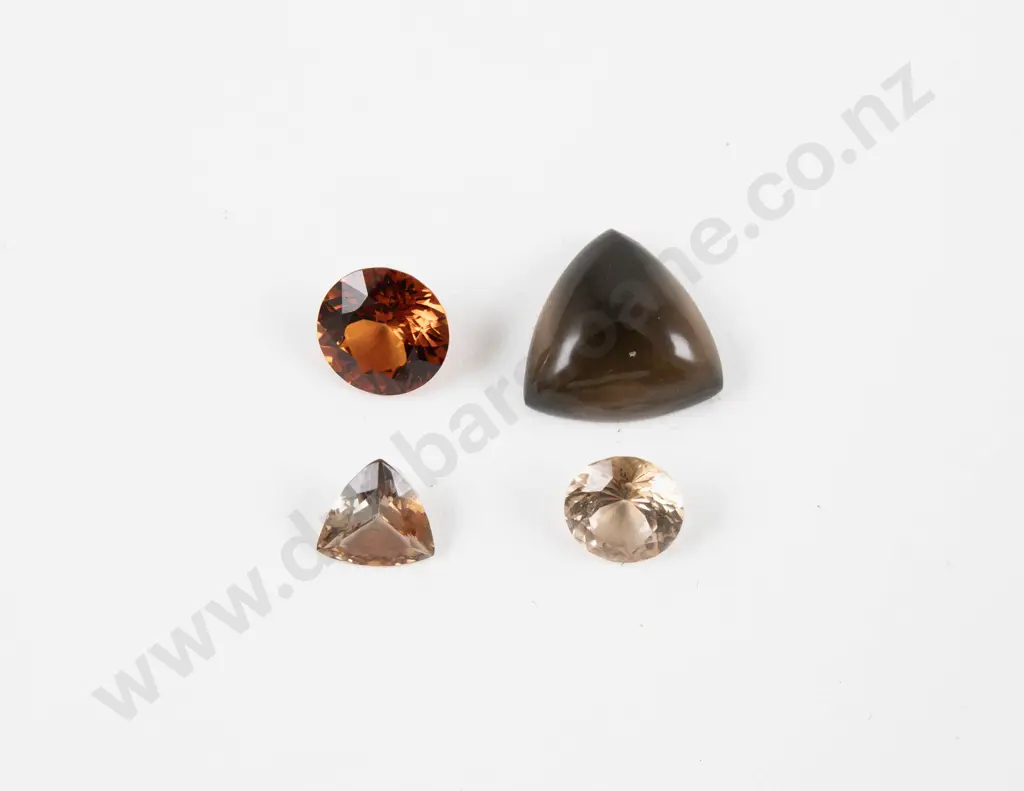 Four Unmounted Gem Stones Image 1++