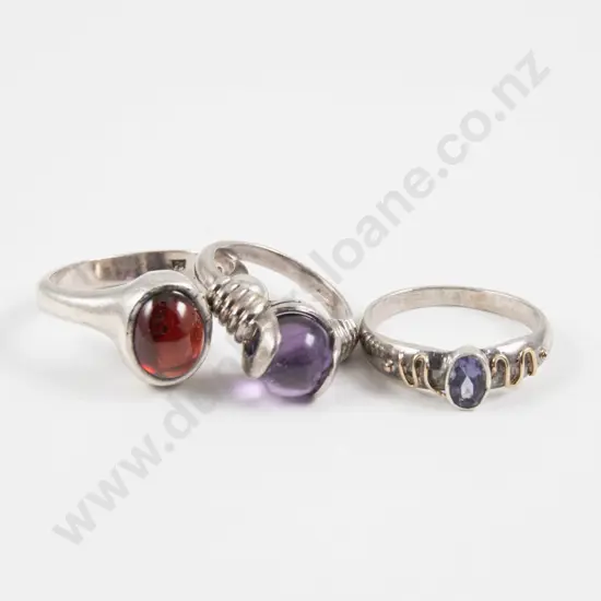 Three Silver and Single Gem Stone Rings