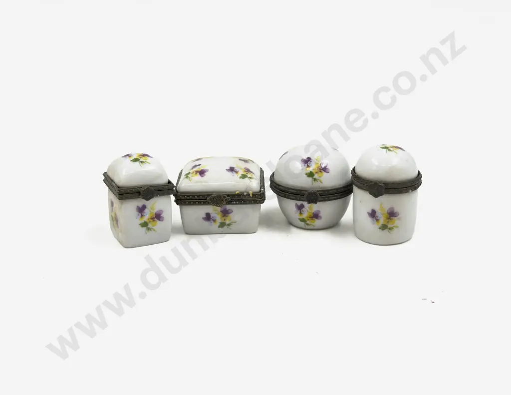 A Cased Set of Four Small Porcelain Trinket Boxes Image 1++