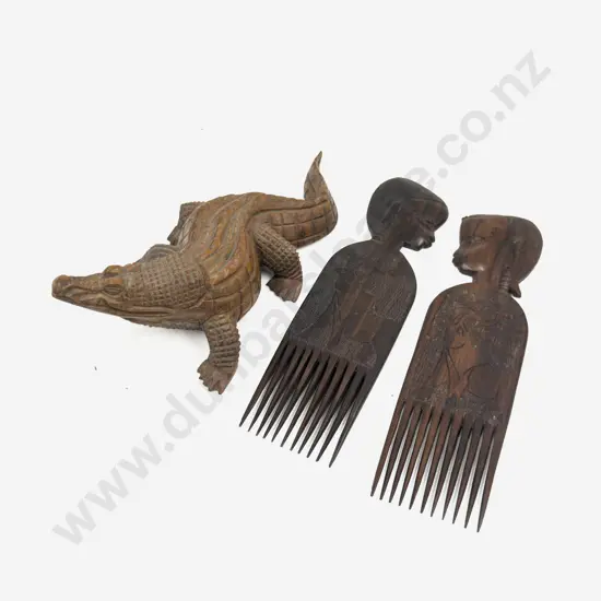 Pair of Figural Combs together with Carved Crock