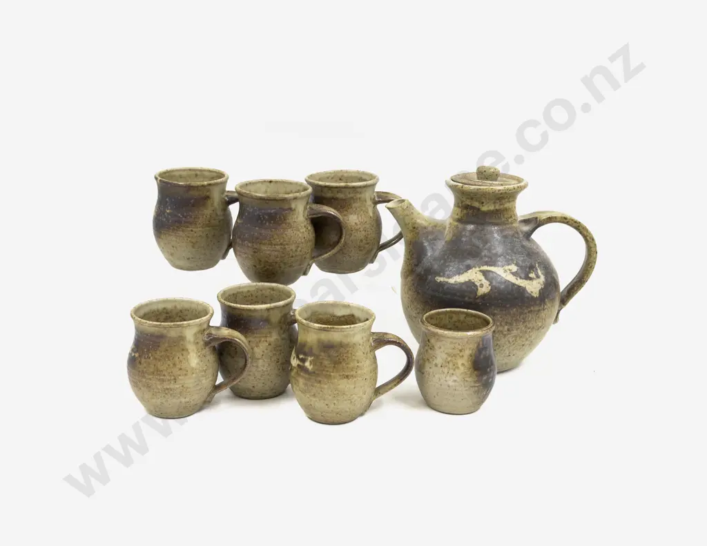 Pottery Teapot and Assorted Cups Image 1++