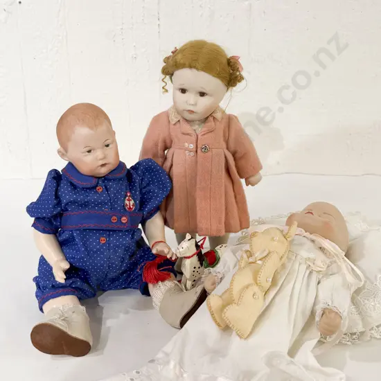 Three Small New Bisque Character and Baby Dolls 29cm 24cm