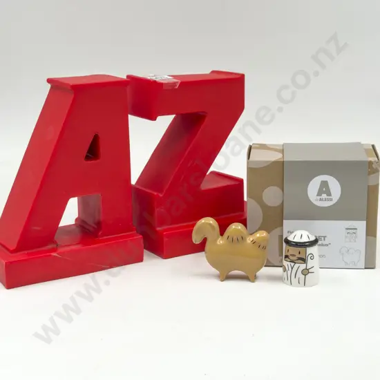 Boxed Alessi Figures together with A to Z Bookends