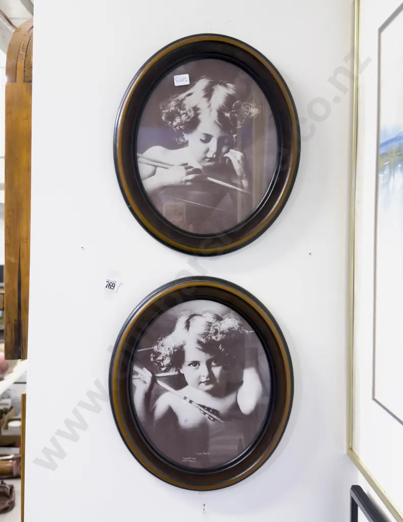 A Pair of Oval Framed Photographic Prints Image 1++