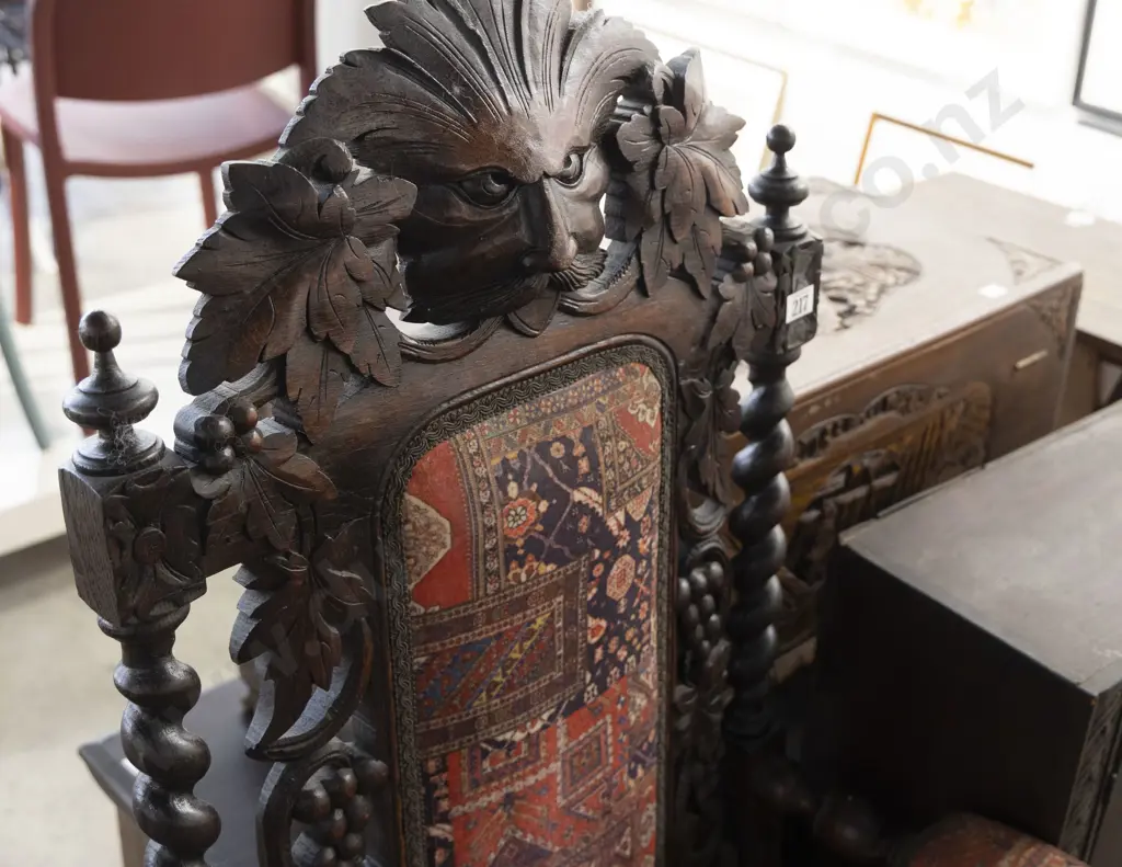 A Victorian Oak Open Armchair of Baroque Design Image 1++