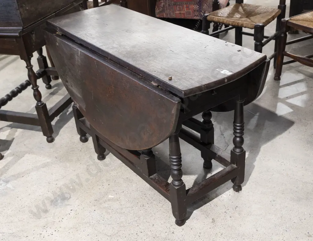 An Early C18th Oak Gateleg Dining Table Image 1++