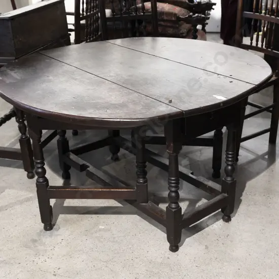 An Early C18th Oak Gateleg Dining Table
