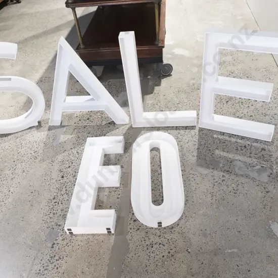 Seven White Painted Wooden Letters