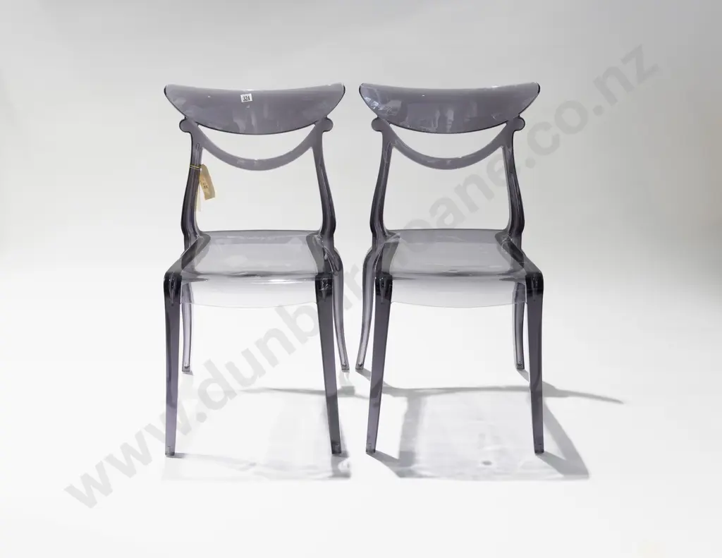 A Pair of Alma Marlene Clear Chairs Image 1++