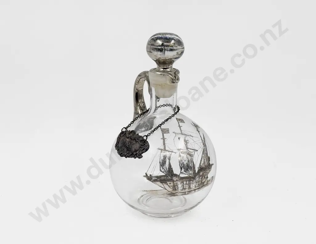 Stoppered Glass Ewer with Nautical Theme Overlay & Plated Decanter Label Image 1++