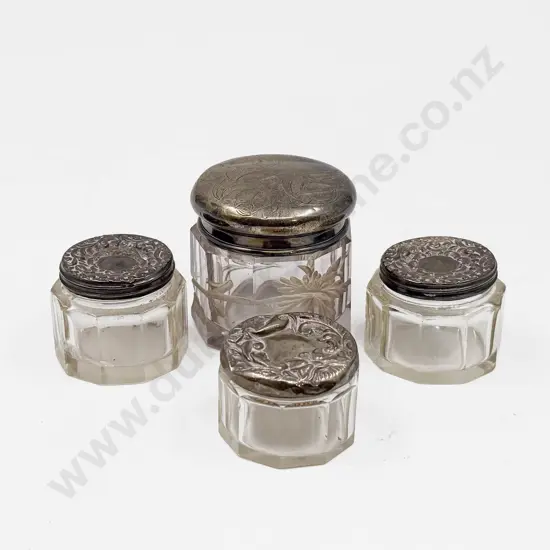 Four Assorted S/S Topped Vanity Jars