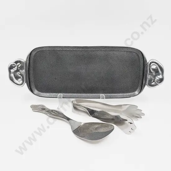 A Carol Boyes Oblong Tray together with Tongs & Cake Slice