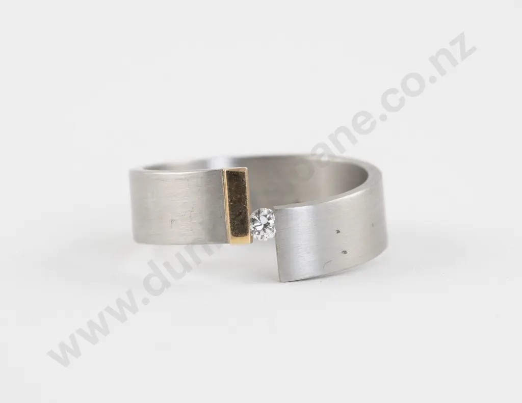 Platinum and 18ct Gold Single Stone Diamond Band Ring Image 1++