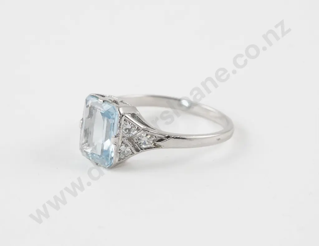 18ct White Gold Seven Stone Diamond and Aquamarine Dress Ring Image 1++
